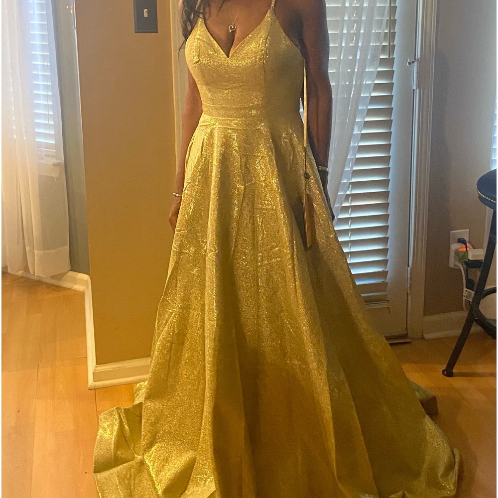 This is a never worn floor length ballroom gown or wedding/prom dress.